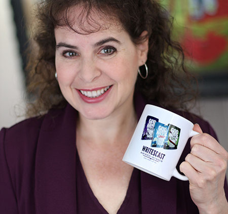 Silvia Acevedo holding a mug showing the covers of her books, the God Awful series, with the words "Award Winner 2019 Most Listens" for The Writescast Network podcast.