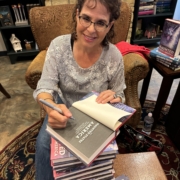 Author Silvia Acevedo signs her book THE HAUNTED STATES OF AMERICA at Daydream Believer Books and Gifts in Lake Mills, Wisconsin